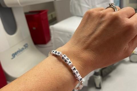 Beaded bracelet on Marisa's wrist that reads "You Got This"