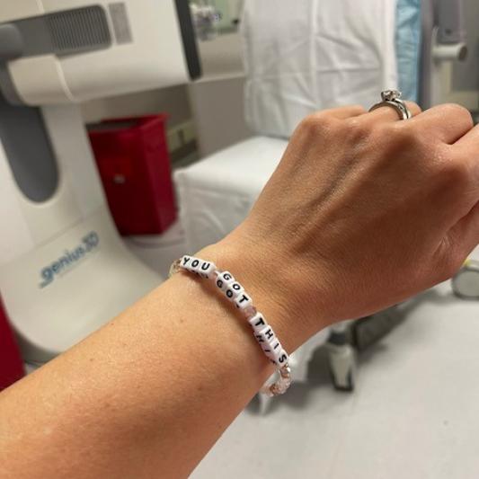 Beaded bracelet on Marisa's wrist that reads "You Got This"